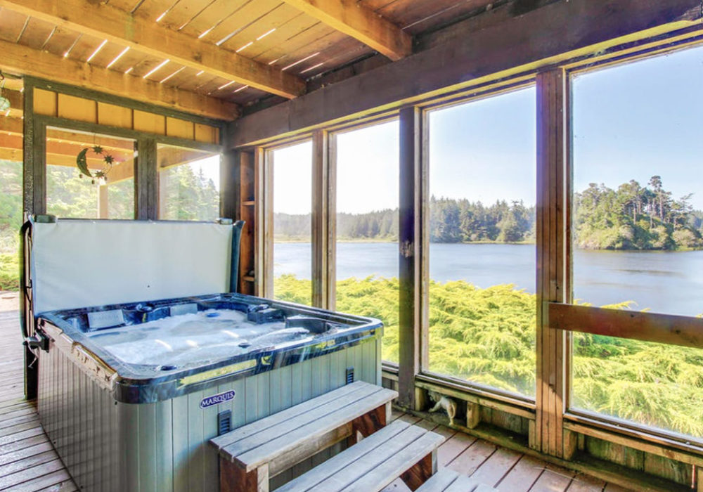 Hot tub on lower deck with view towards Floras Lake