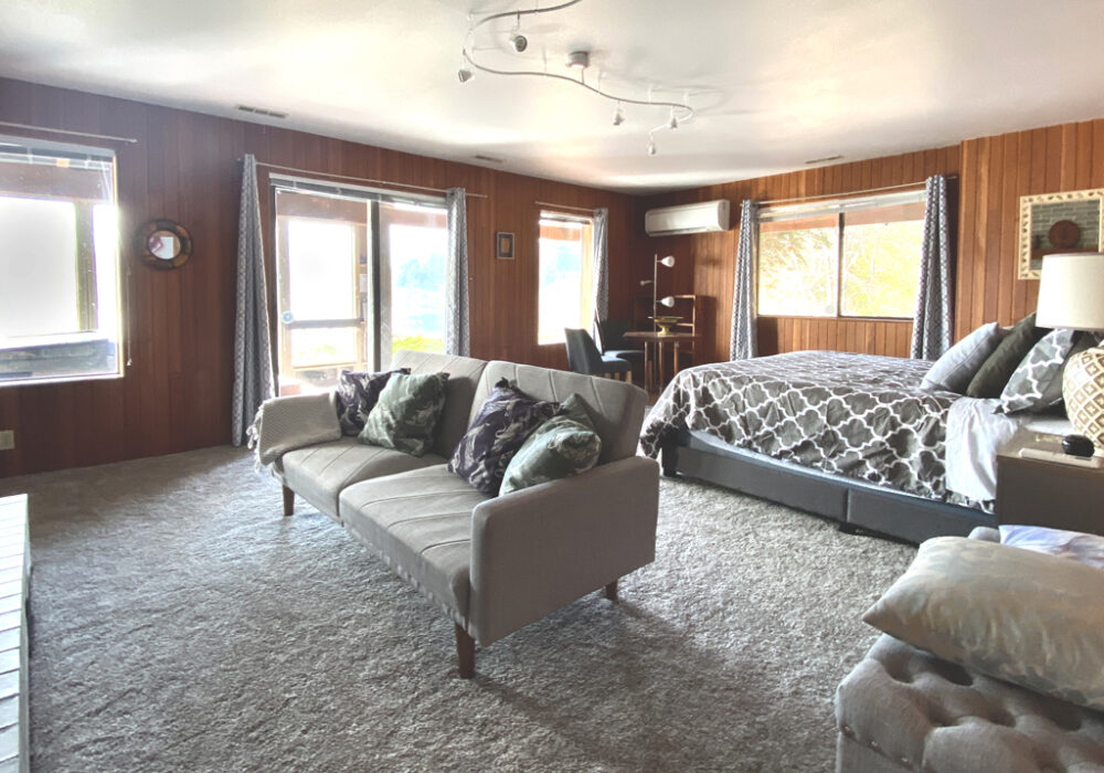 Floras Lake Getaway grey Bedroom - Vacation Rental